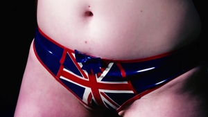 HarmonyVision-Video: Ginger slut wearing latex fetish tied up